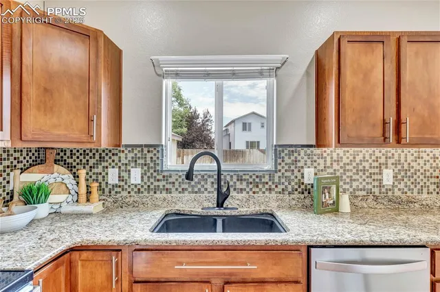 a bathroom with sink and mirror