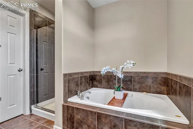 a bathroom with a bathtub and a sink