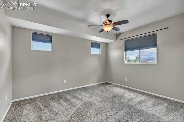 a view of a house with backyard and porch