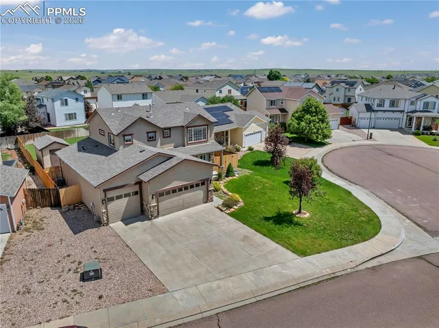 a view of a house with a big yard