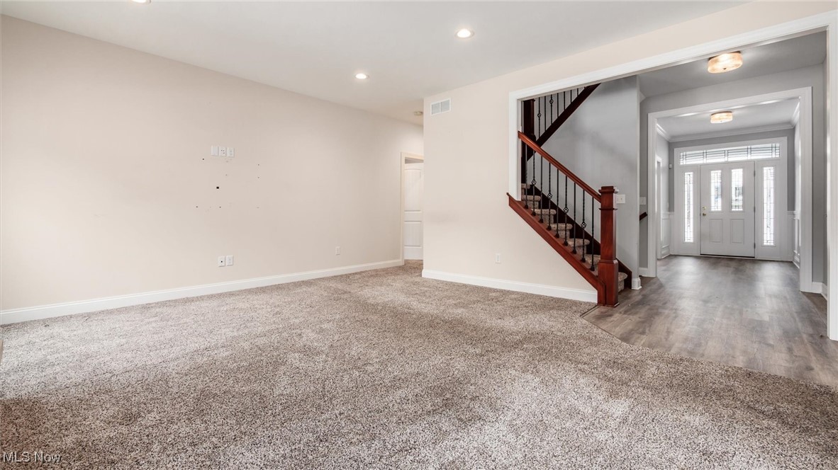 4641 Foote Road Medina, OH 44256 - Photo 12 of 46 Entryway with recessed lighting, light colored carpet, and stairs