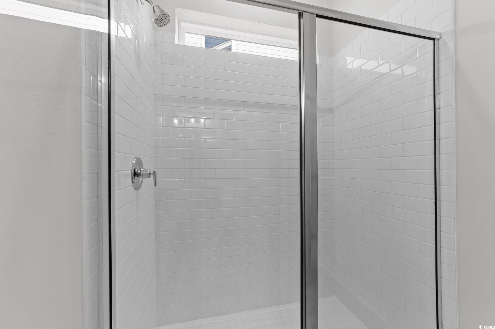 771 Ebb Tide Road Little River, SC 29566 - Photo 29 of 35 Bathroom featuring a shower stall