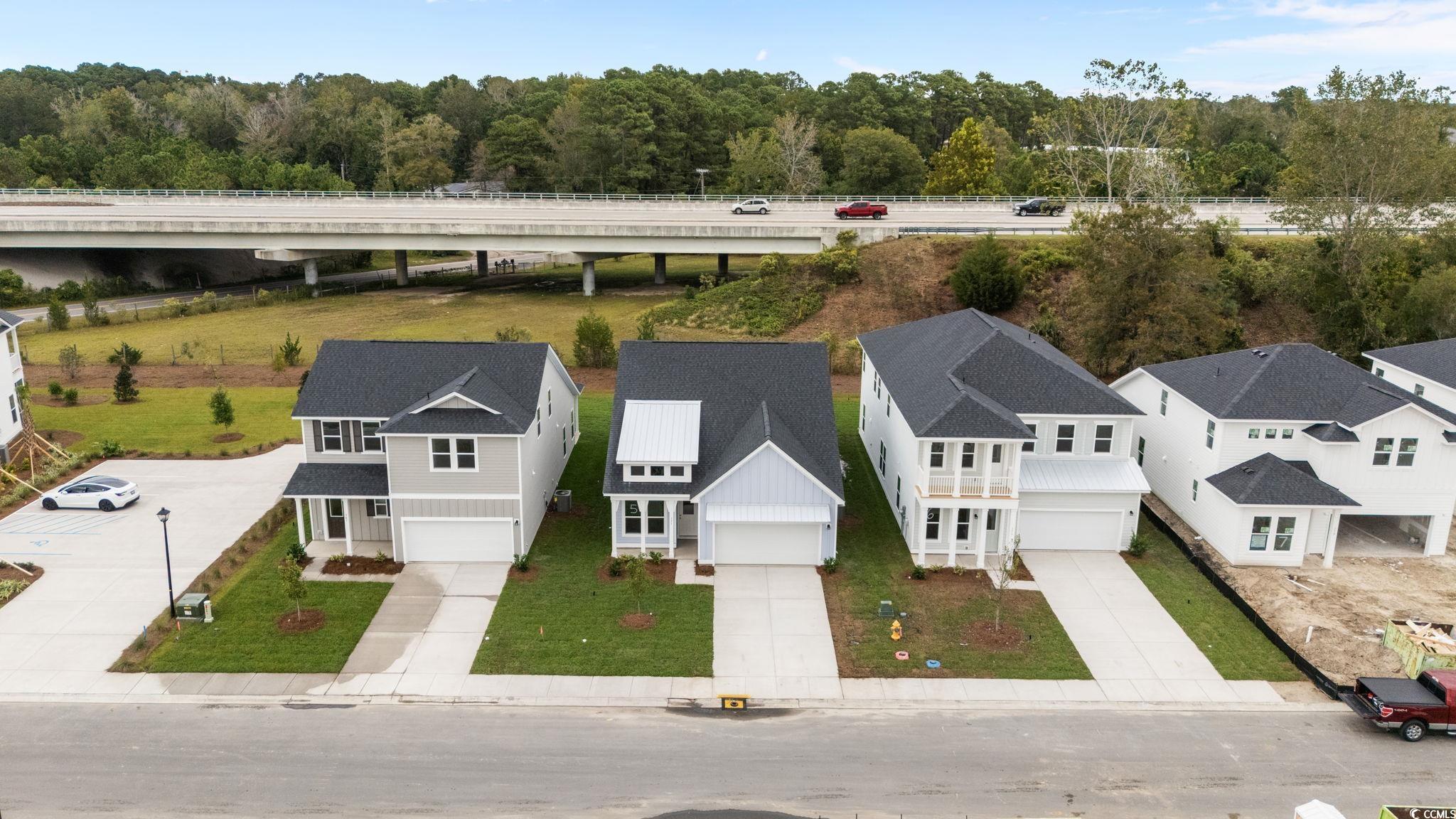 771 Ebb Tide Road Little River, SC 29566 - Photo 9 of 35 Aerial perspective of suburban area