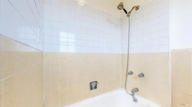 a view of a backyard with swimming pool