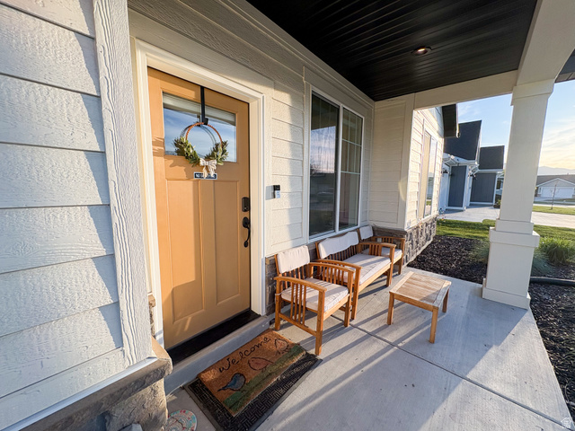 412 West 3025th Street South Logan, UT 84321 - Photo 12 of 34 Property entrance featuring covered porch