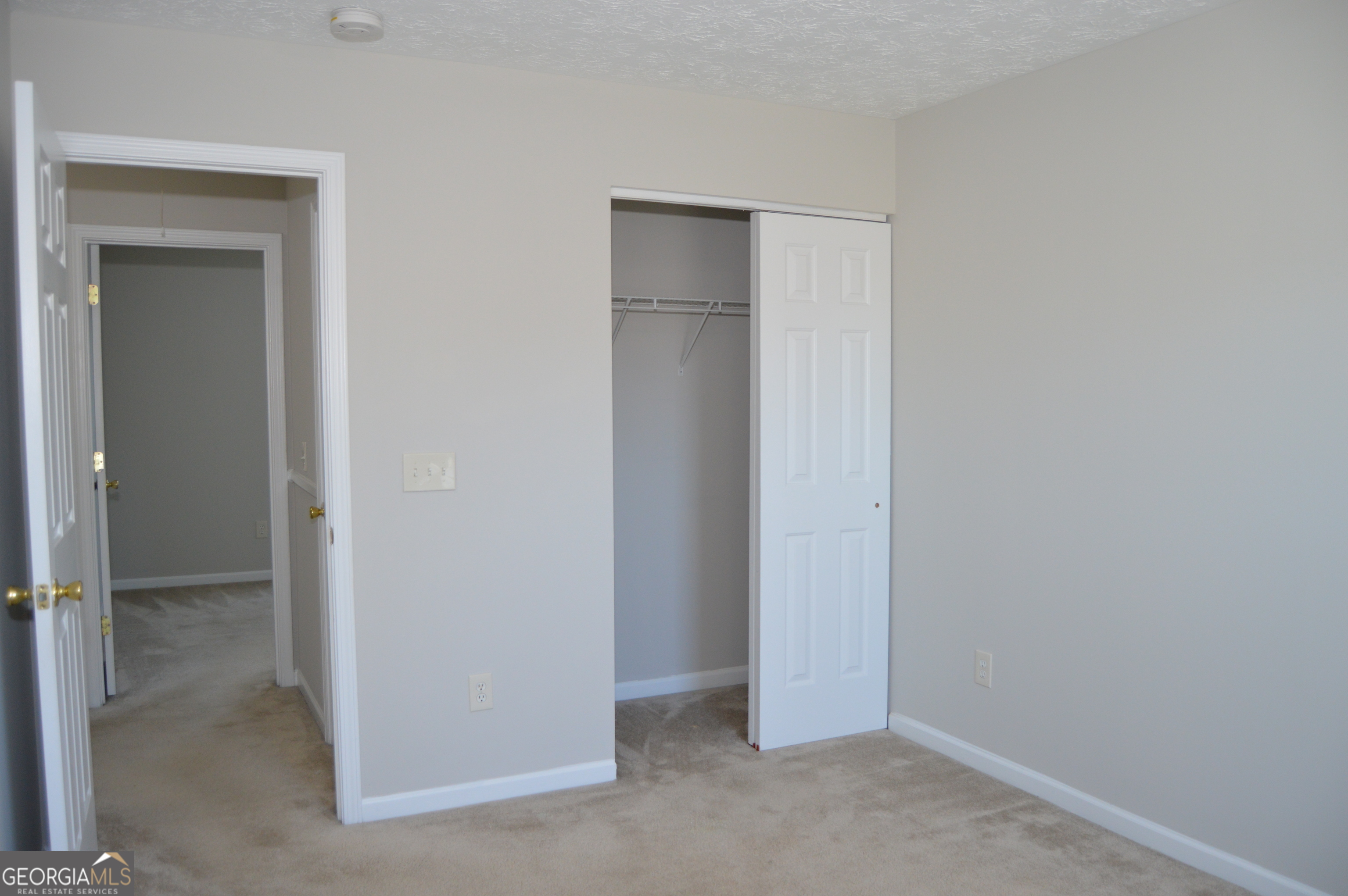 5765 Ridge Stone Way Cumming, GA 30041 - Photo 16 of 22 a view of an empty room