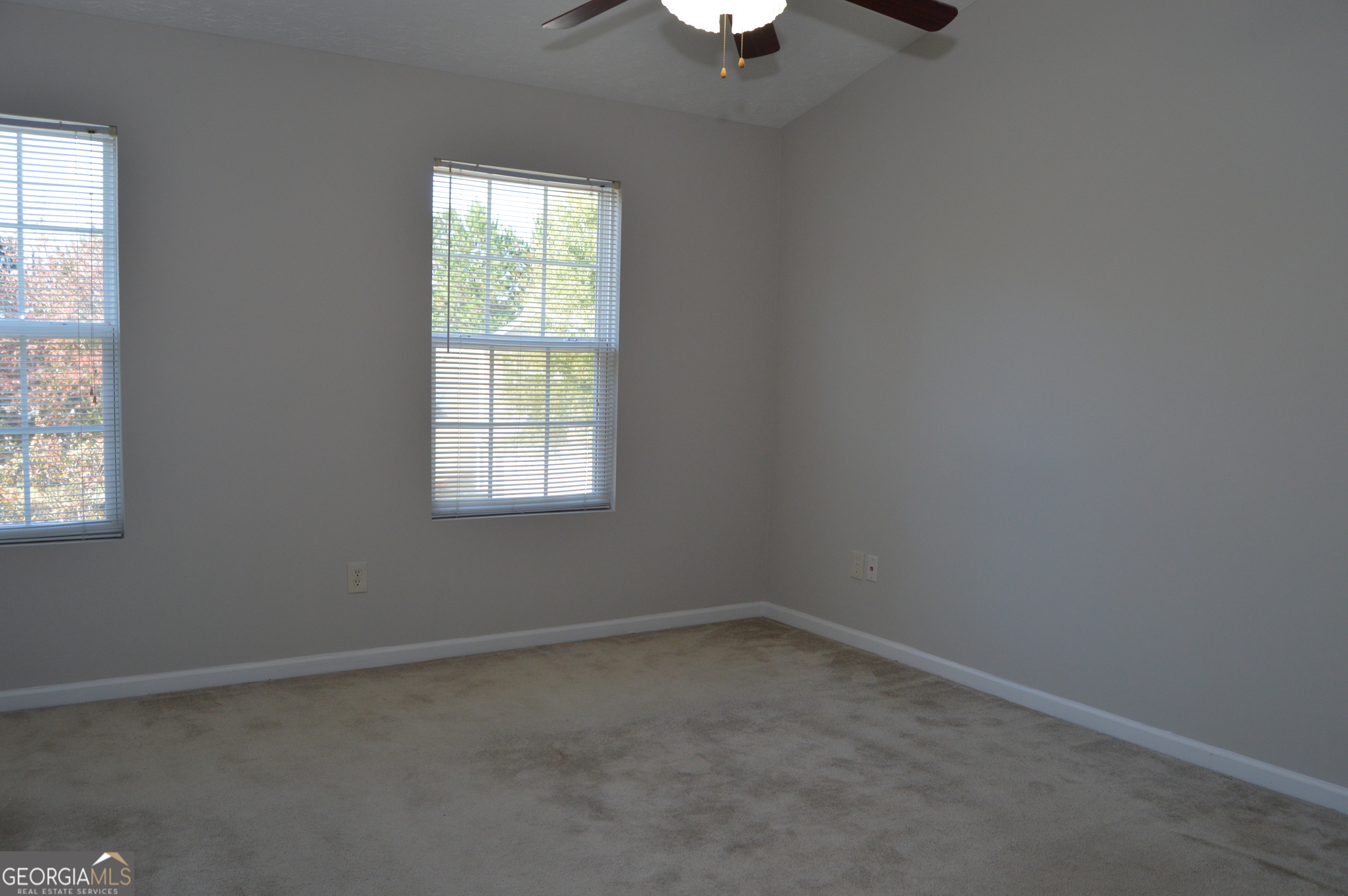5765 Ridge Stone Way Cumming, GA 30041 - Photo 20 of 22 an empty room with a window