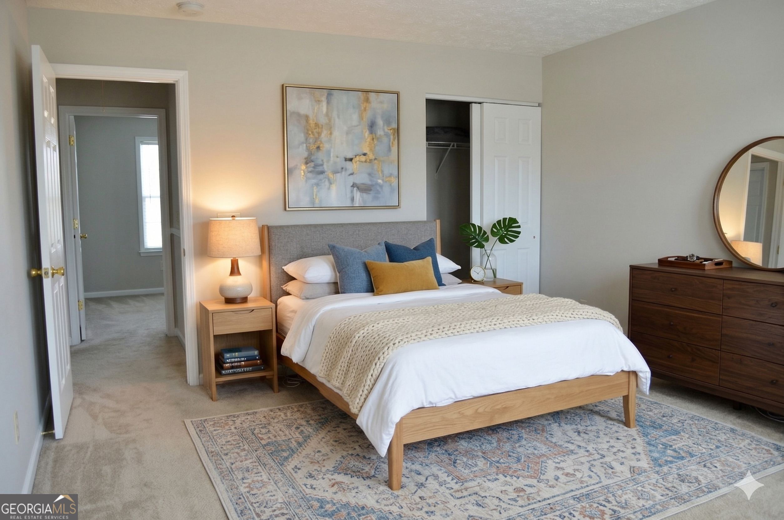5765 Ridge Stone Way Cumming, GA 30041 - Photo 8 of 22 a bedroom with bed and wooden floor