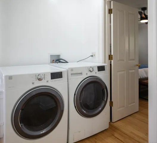 a utility room with dryer and washer