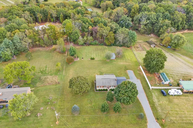 a view of a yard with an outdoor space