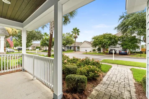 a view of a porch with a big yard