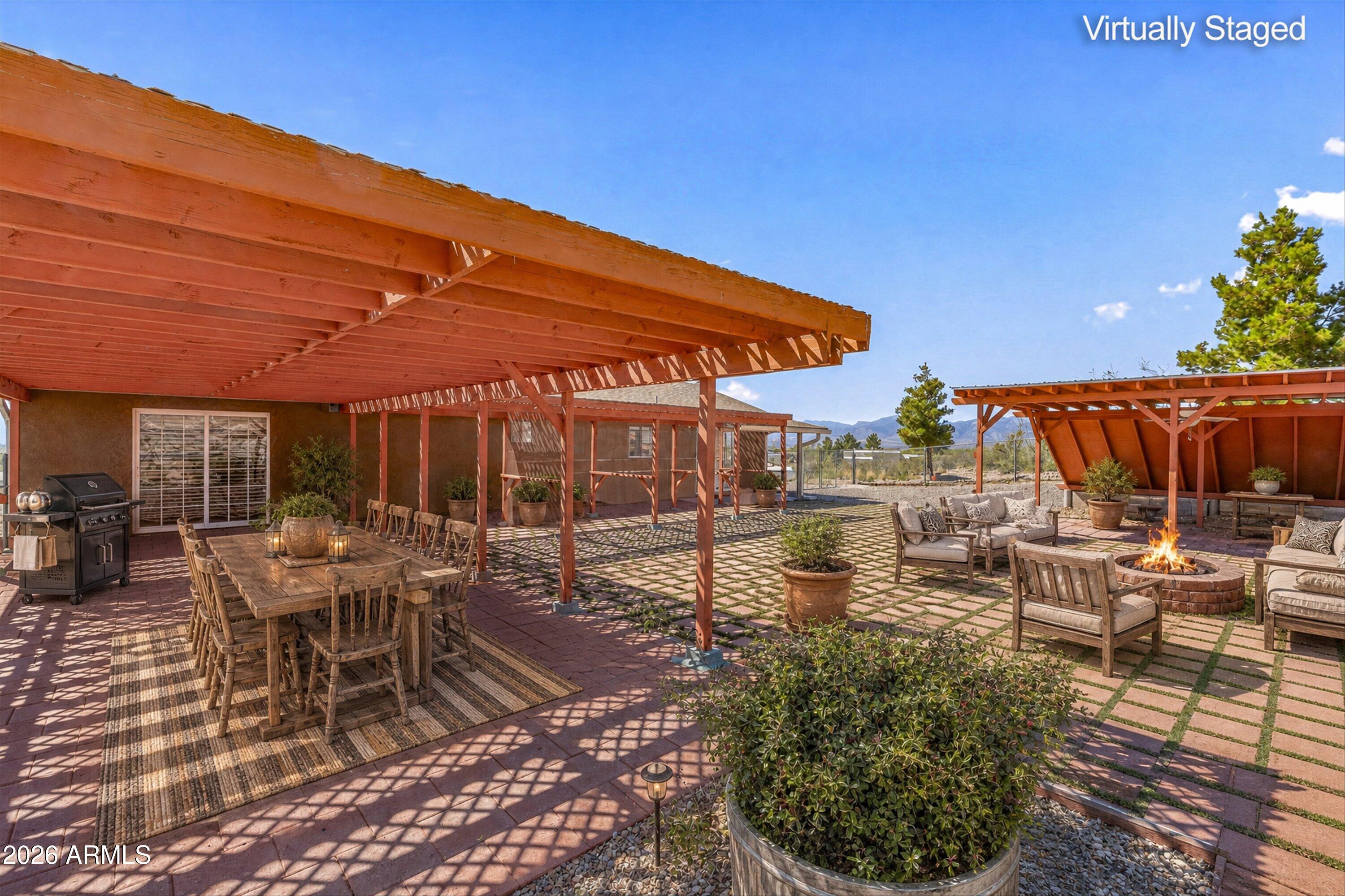 2251 North Spanish Trail Huachuca City, AZ 85616 - Photo 35 of 44 35-Staged Back Patio & Yard