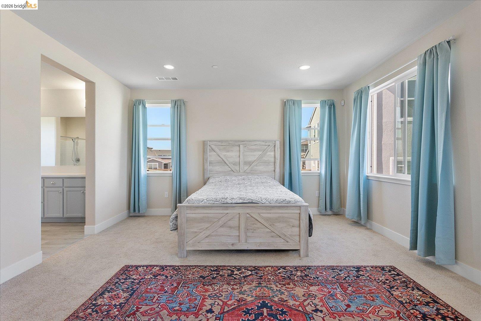 5601 Ridgepoint Way Antioch, CA 94531 - Photo 36 of 59 Carpeted room with recessed lighting and multiple windows