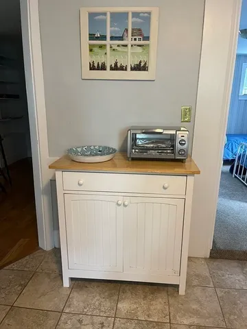 a utility room with washer and dryer