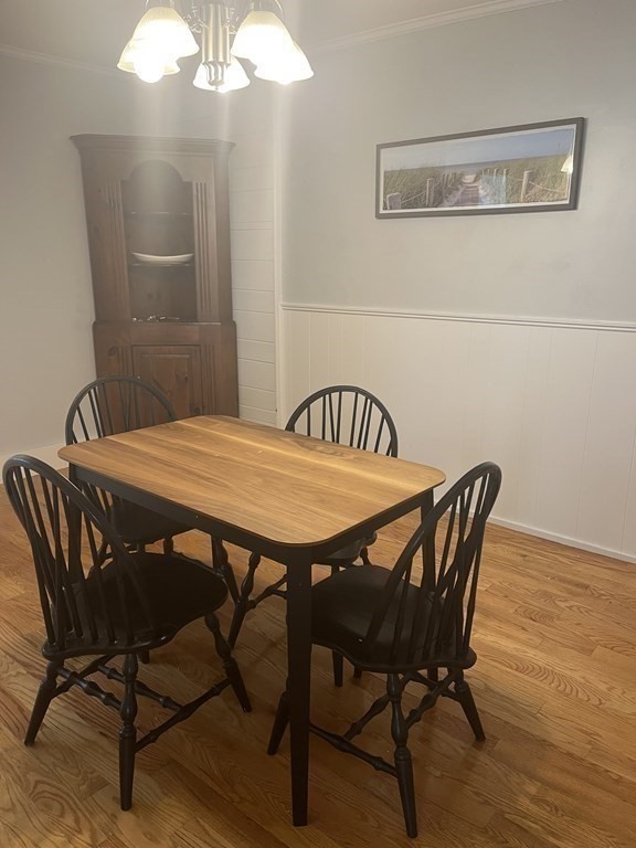 21 Blaney Street, Unit 1 Swampscott, MA 01907 - Photo 14 of 24 a view of a dining room with furniture and wooden floor