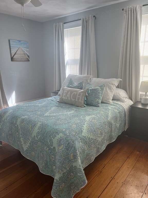 21 Blaney Street, Unit 1 Swampscott, MA 01907 - Photo 16 of 24 a bedroom with a bed and a window