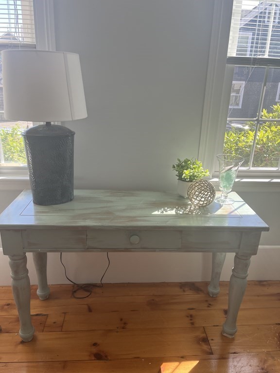 21 Blaney Street, Unit 1 Swampscott, MA 01907 - Photo 3 of 24 a bathroom with a sink and a mirror