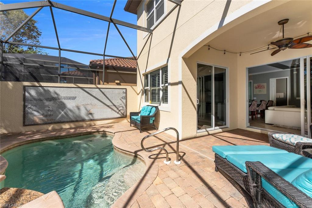 5769 Mango Circle Naples, FL 34110 - Photo 13 of 42 a view of a house with backyard