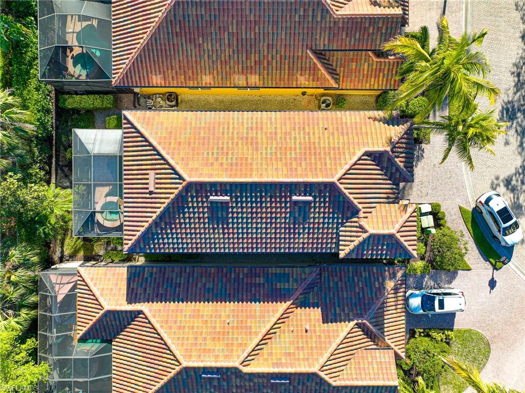 5769 Mango Circle Naples, FL 34110 - Photo 16 of 42 a view of outdoor space and deck