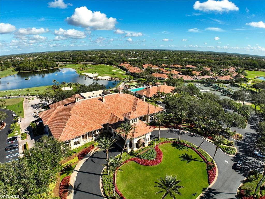 5769 Mango Circle Naples, FL 34110 - Photo 31 of 42 an aerial view of a residential houses with outdoor space