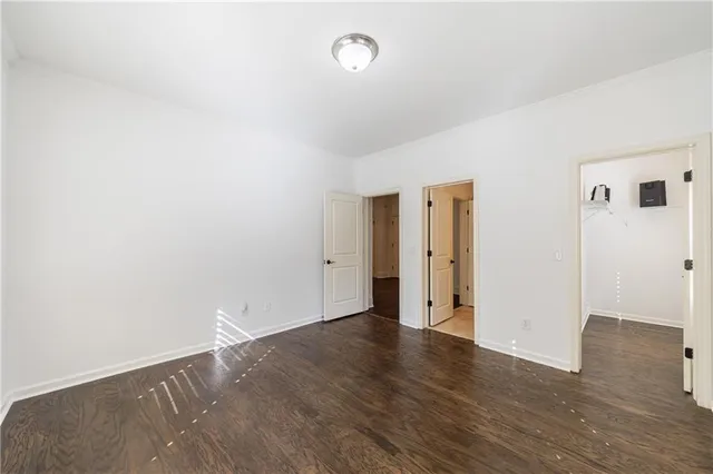 a view of a lake in middle of forest