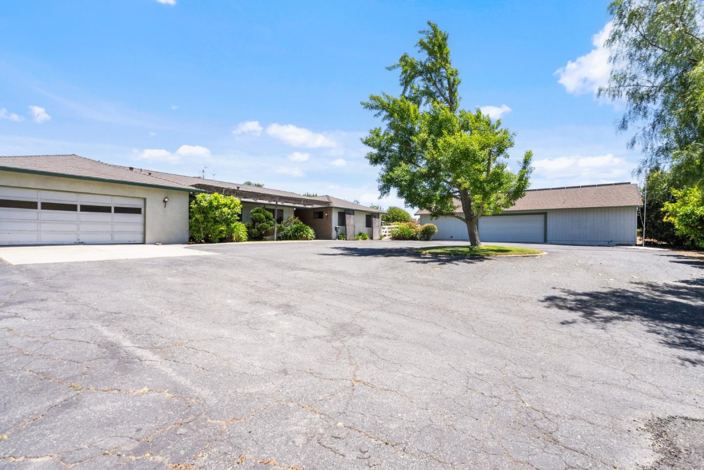 a house with trees in front of it