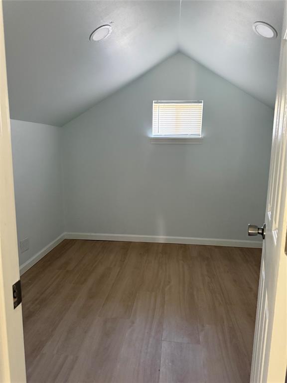 404 West Elm Street Whitewright, TX 75491 - Photo 7 of 8 an empty room with a window