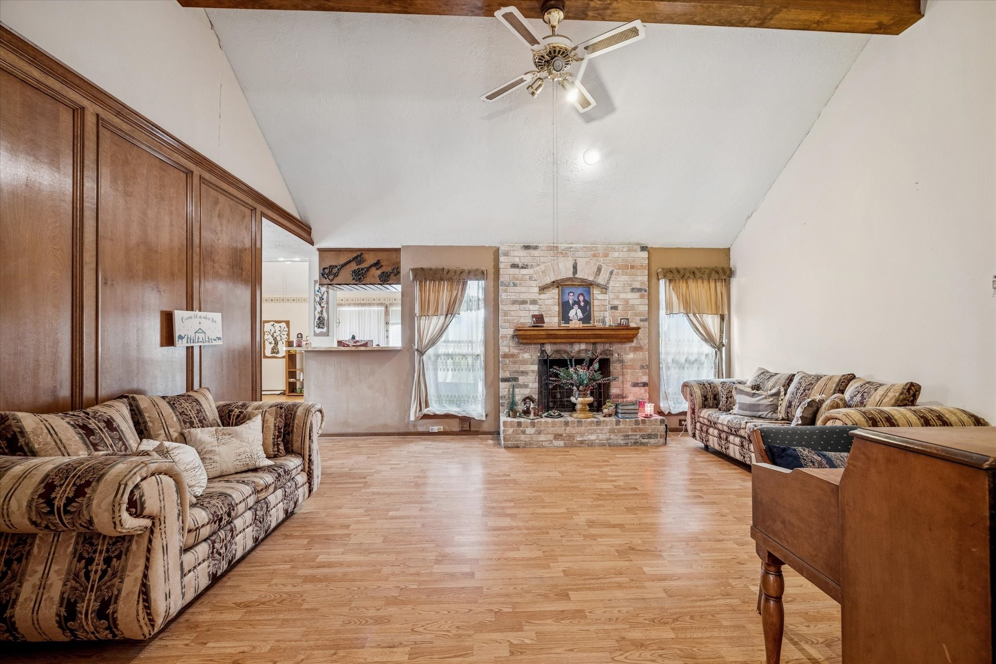 15427 Rio Plaza Drive Houston, TX 77083 - Photo 6 of 16 a living room with furniture and a fireplace