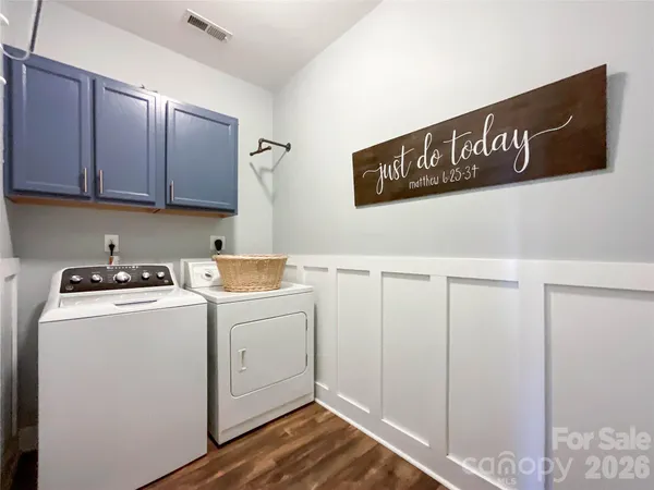 a utility room with dryer and washer