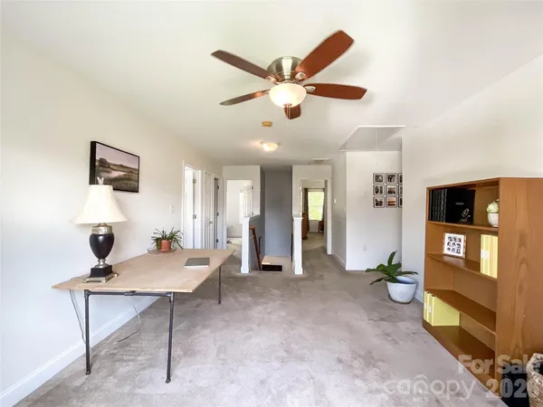 a living room with furniture and window