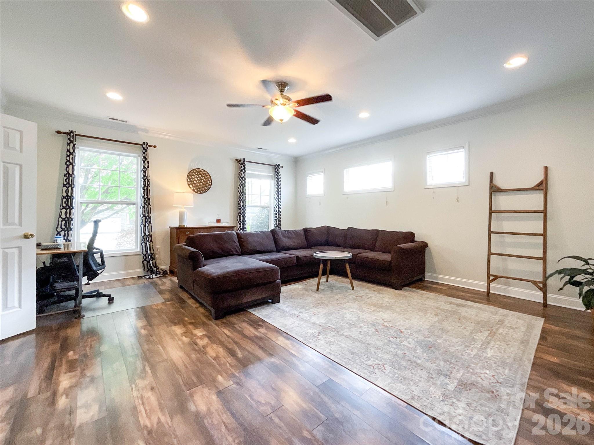 1007 Matilda Lane Indian Trail, NC 28079 - Photo 3 of 43 a living room with furniture and a large window