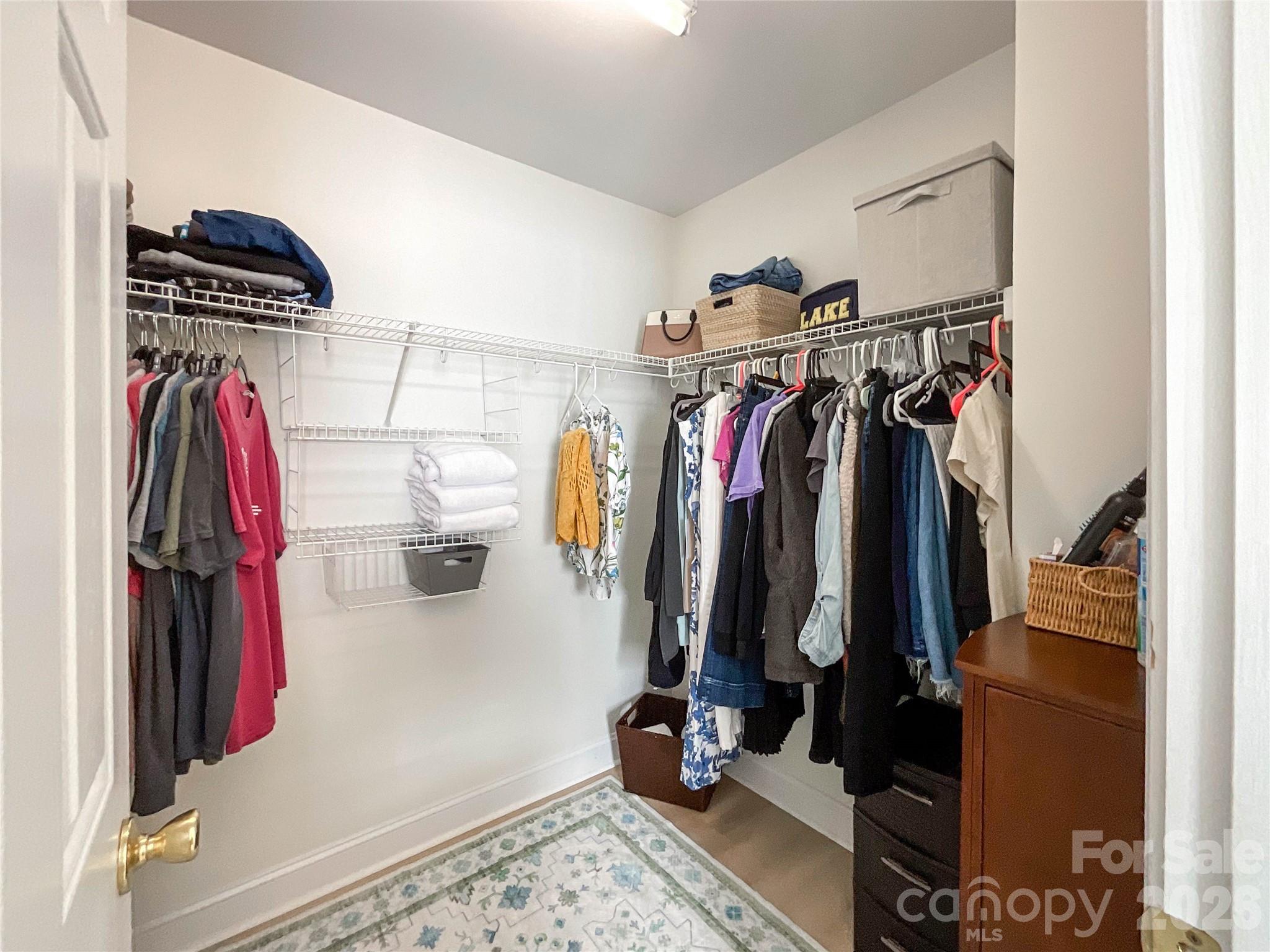 1007 Matilda Lane Indian Trail, NC 28079 - Photo 33 of 43 a view of walk in closet with clothes