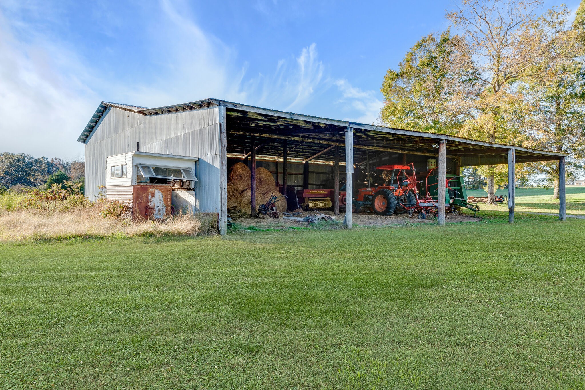 2154 Abiff Road Burns, TN 37029 - Photo 12 of 50 a view of a room that has wooden fence and a large tree