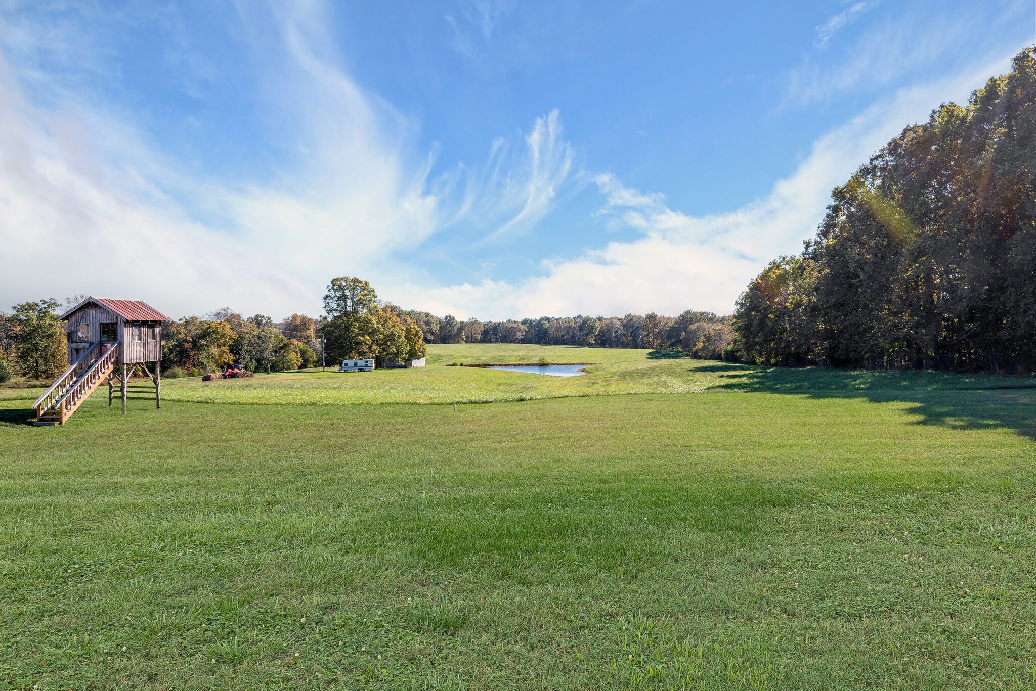 2154 Abiff Road Burns, TN 37029 - Photo 13 of 50 a view of a golf course with a lake