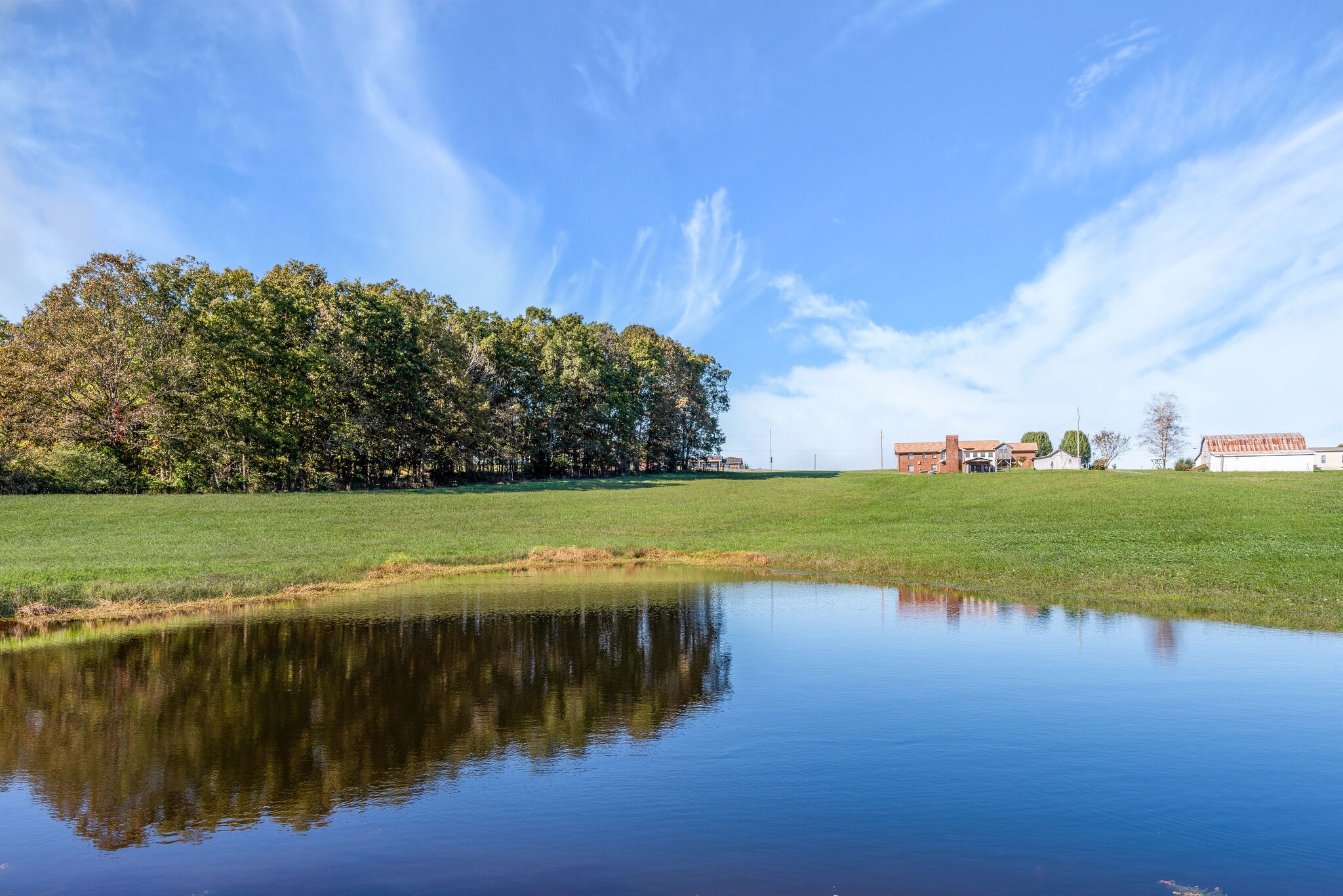 2154 Abiff Road Burns, TN 37029 - Photo 14 of 50 a view of a lake with houses in the background