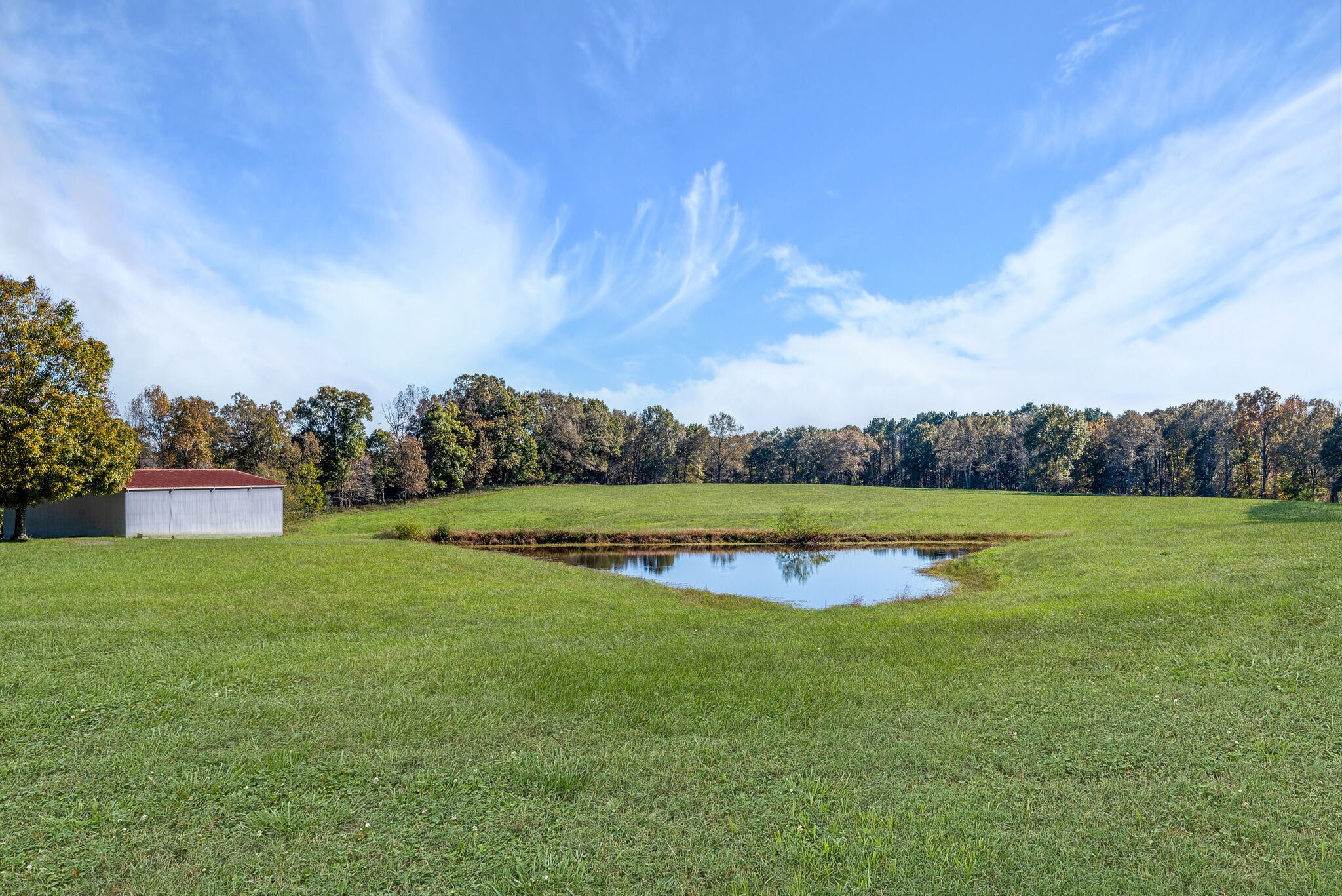 2154 Abiff Road Burns, TN 37029 - Photo 15 of 50 a view of a lake and a yard