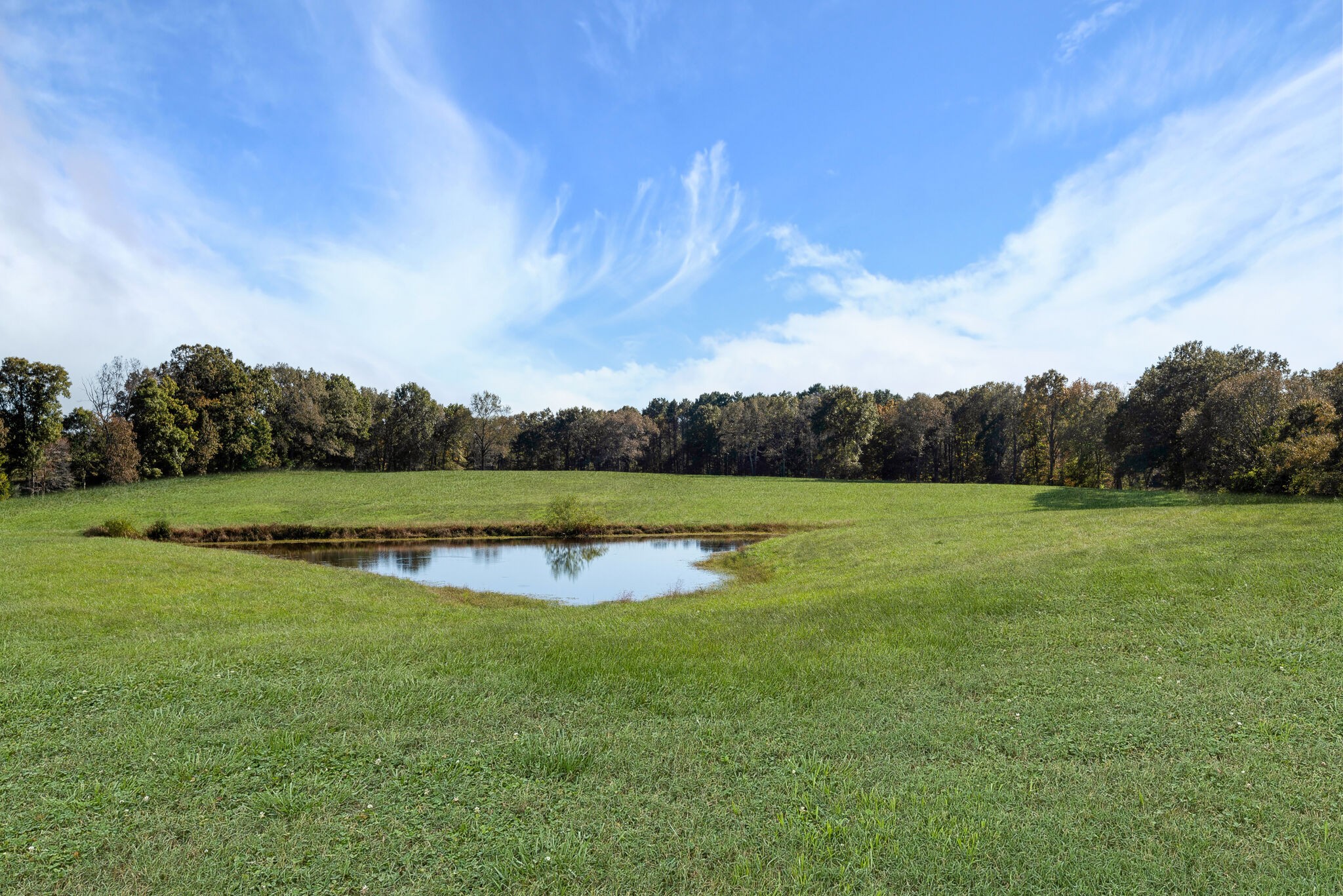2154 Abiff Road Burns, TN 37029 - Photo 19 of 50 a view of a lake with houses in the back