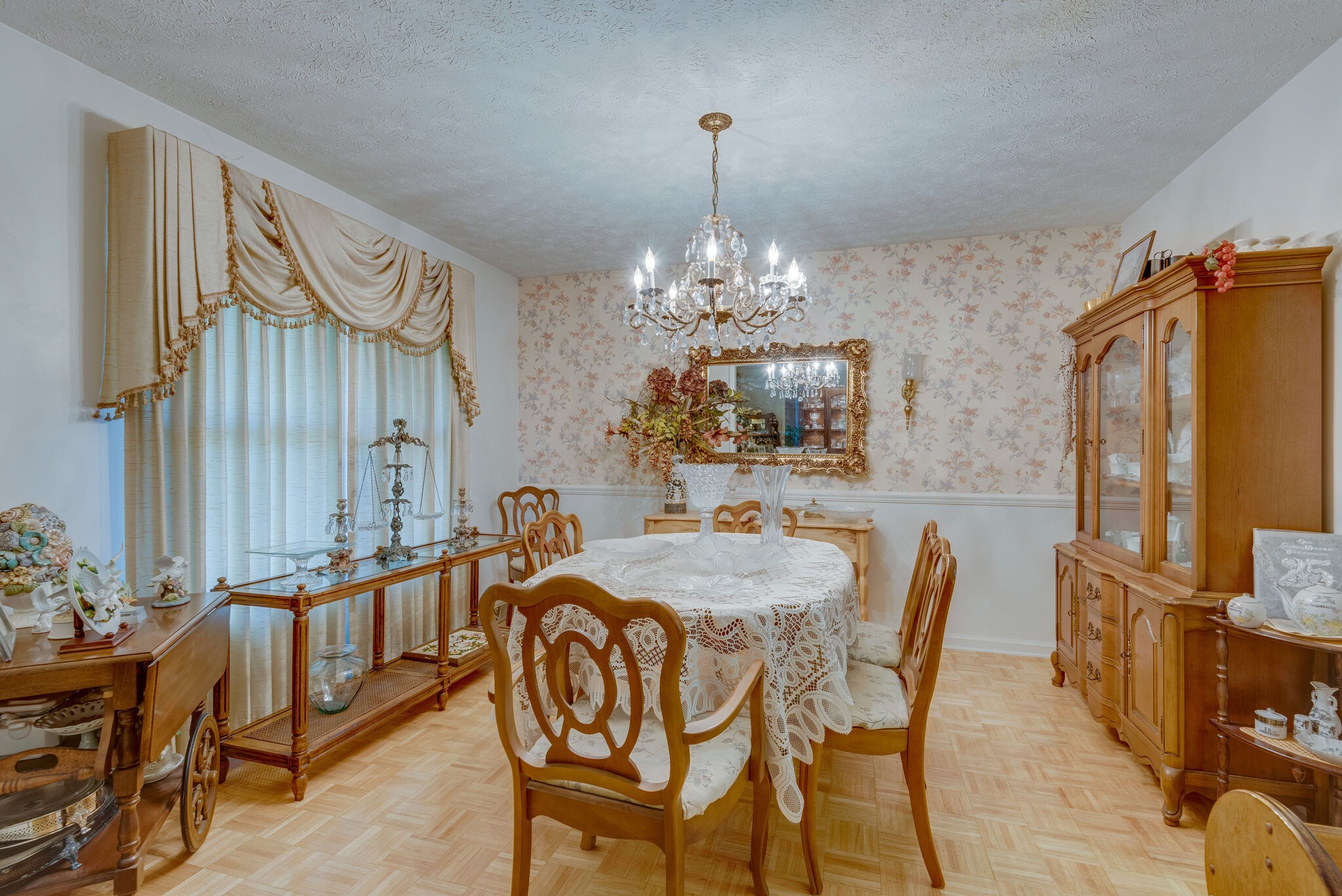 2154 Abiff Road Burns, TN 37029 - Photo 34 of 50 a dining room with furniture a chandelier and wooden floor