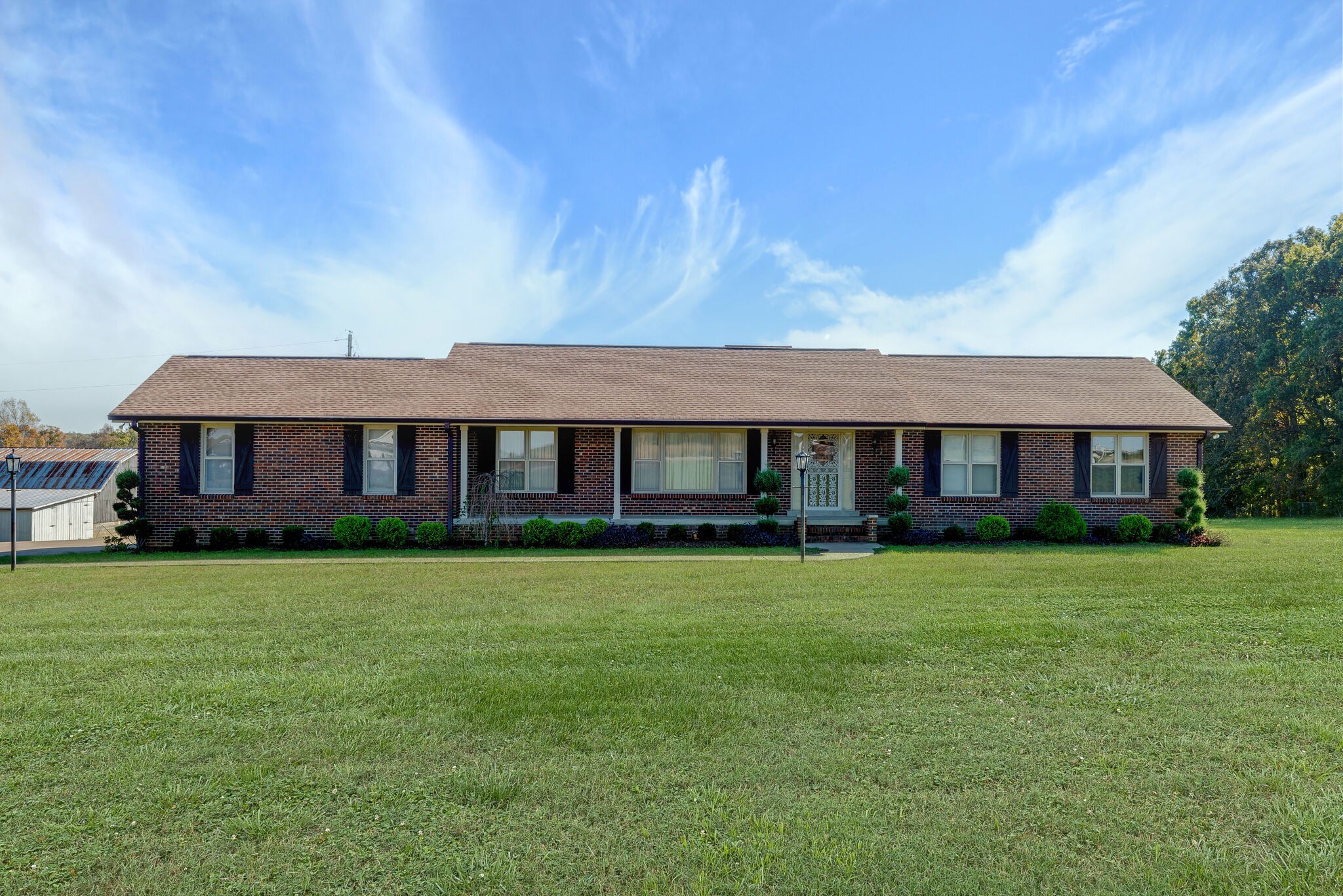 2154 Abiff Road Burns, TN 37029 - Photo 5 of 50 a front view of a house with a yard