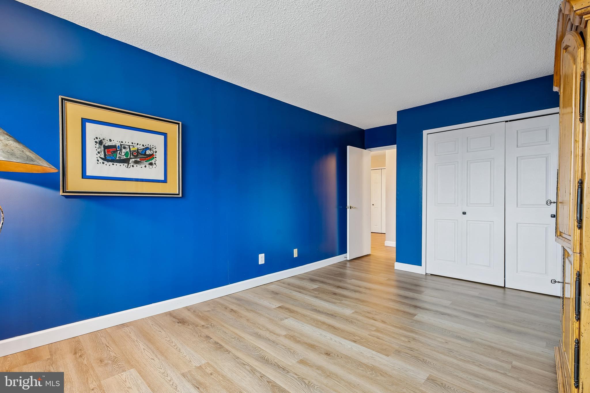 5225 Pooks Hill Road, Unit 629S Bethesda, MD 20814 - Photo 22 of 58 a view of an empty room with wooden floor