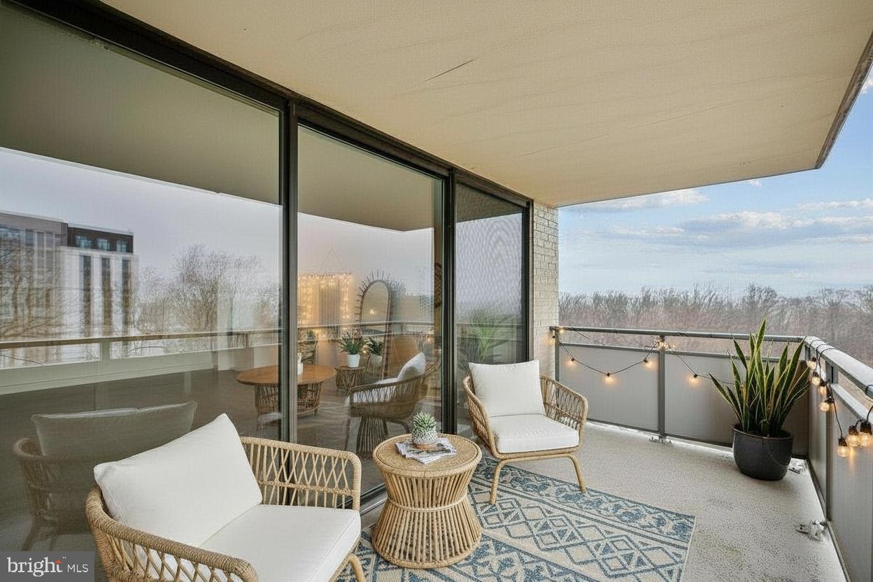 5225 Pooks Hill Road, Unit 629S Bethesda, MD 20814 - Photo 3 of 58 a view of a balcony filled with furniture