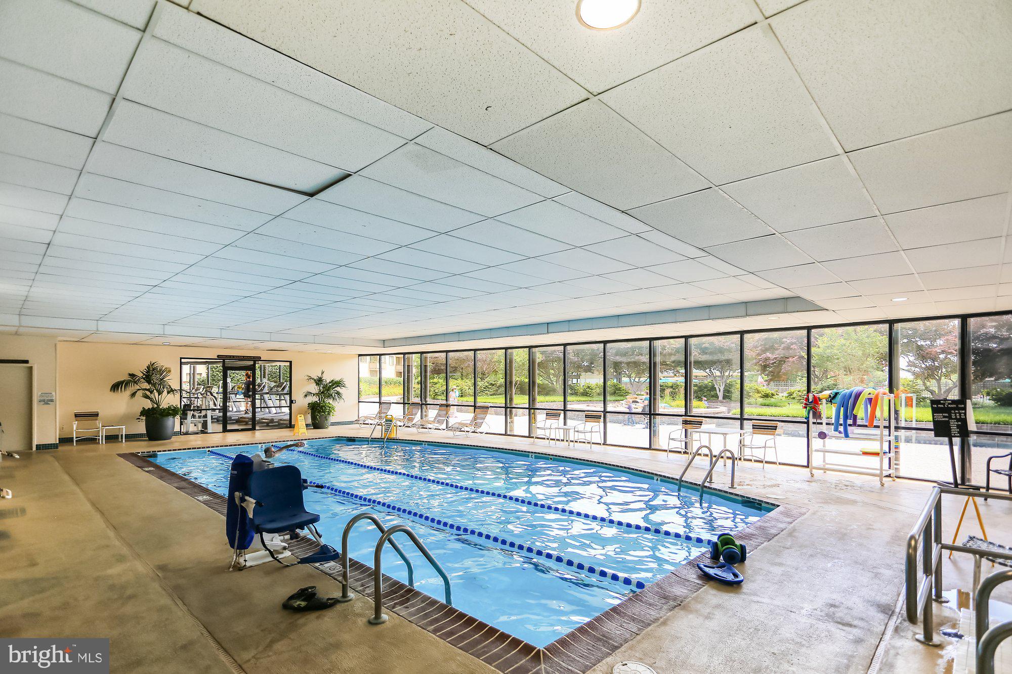 5225 Pooks Hill Road, Unit 629S Bethesda, MD 20814 - Photo 43 of 58 a room with gym equipment and large windows