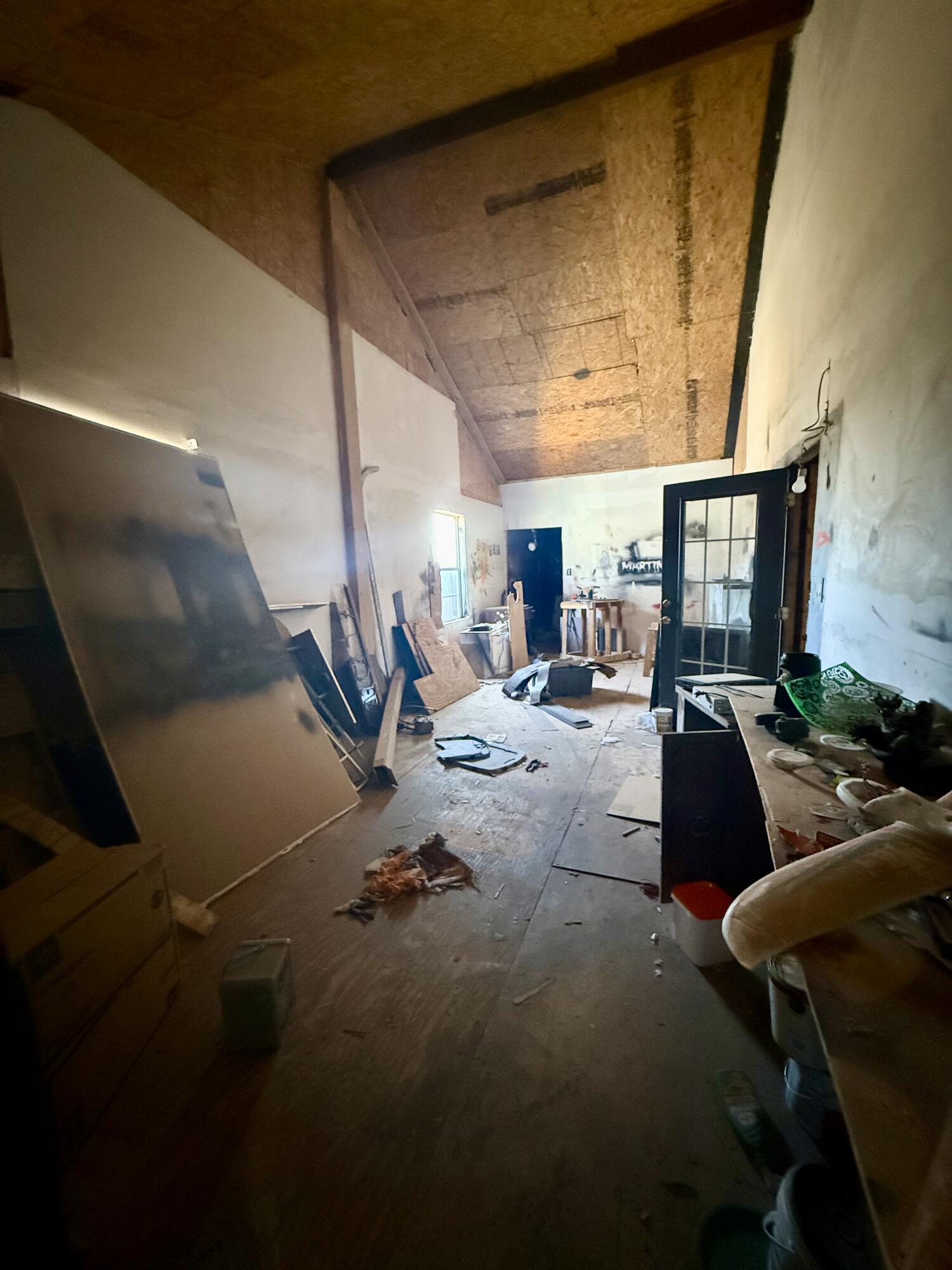 6119 20th Street Lubbock, TX 79407 - Photo 9 of 9 a living room with furniture and a chandelier