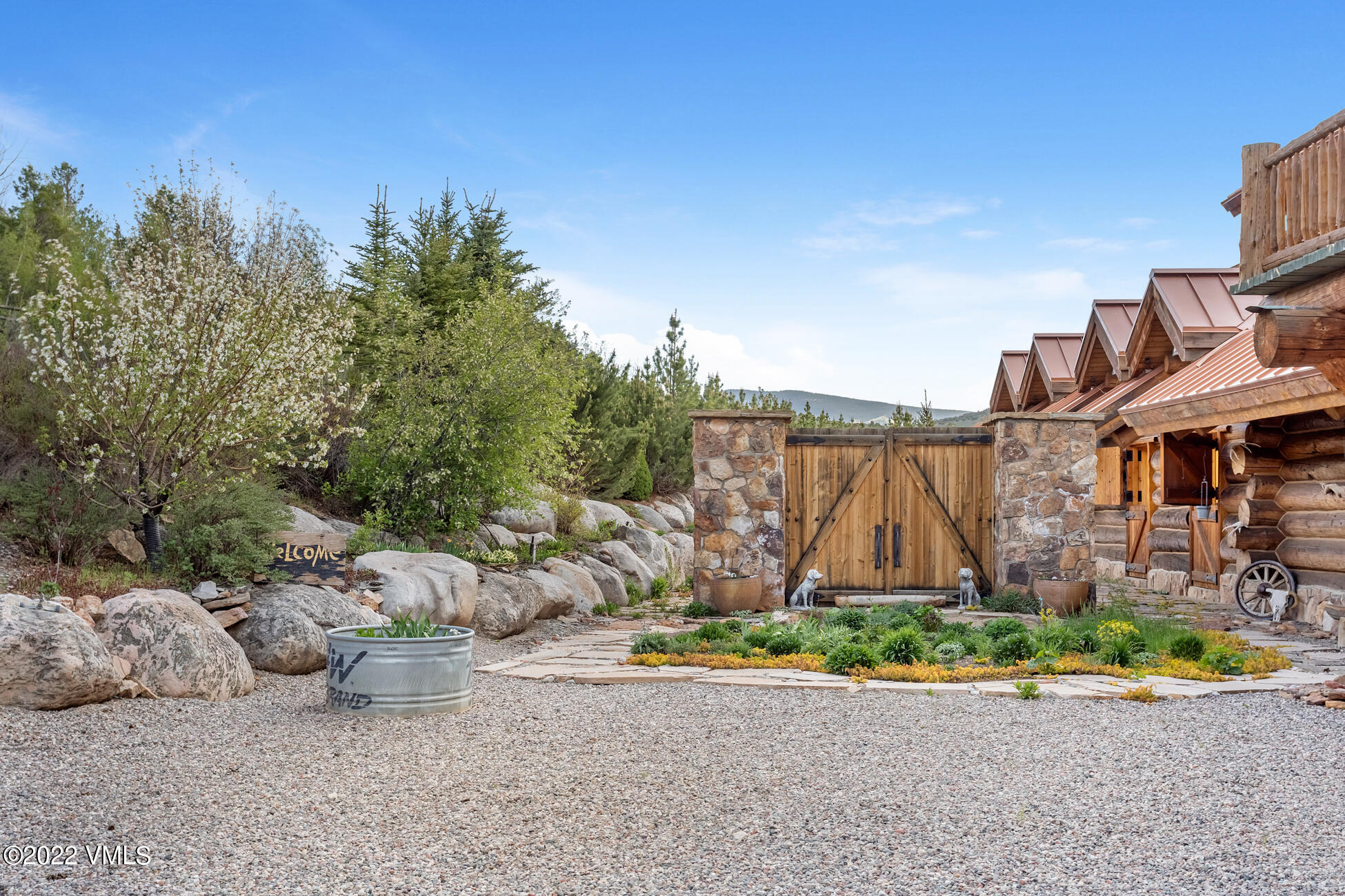 3758 Salt Creek Road Eagle, CO 81631 - Photo 36 of 66 front view of a house with a yard and potted plants
