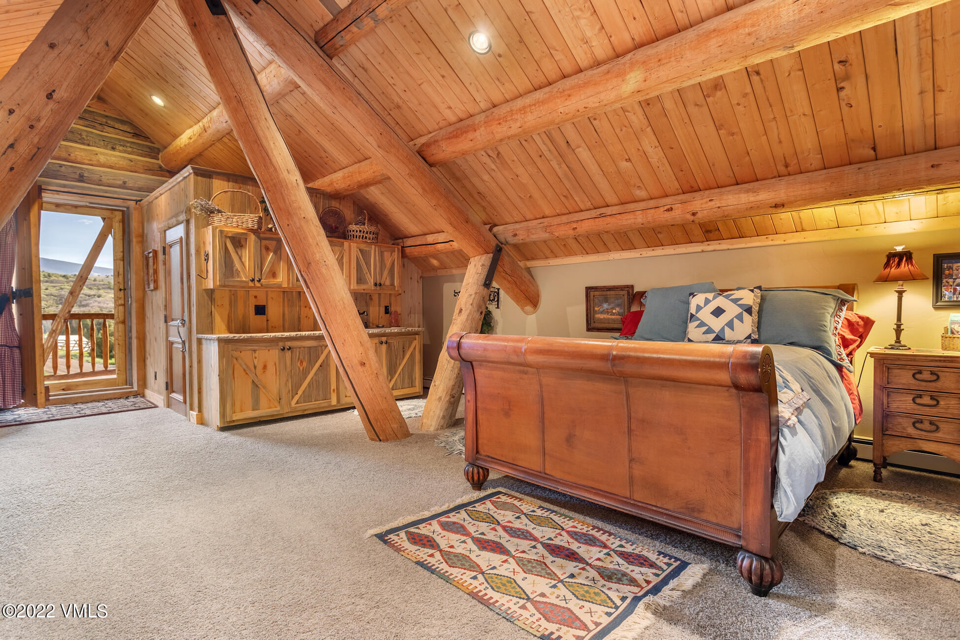 3758 Salt Creek Road Eagle, CO 81631 - Photo 49 of 66 a view of a room with wooden walls