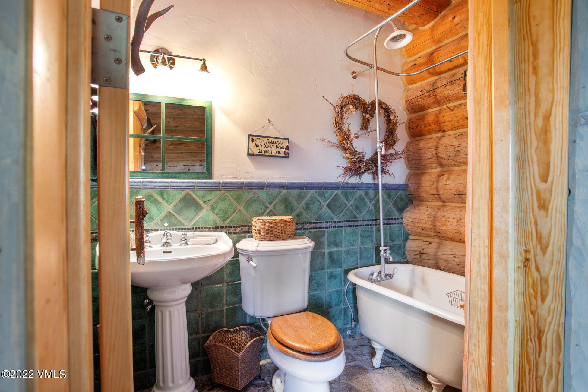 3758 Salt Creek Road Eagle, CO 81631 - Photo 58 of 66 a white toilet sitting next to a bathroom sink