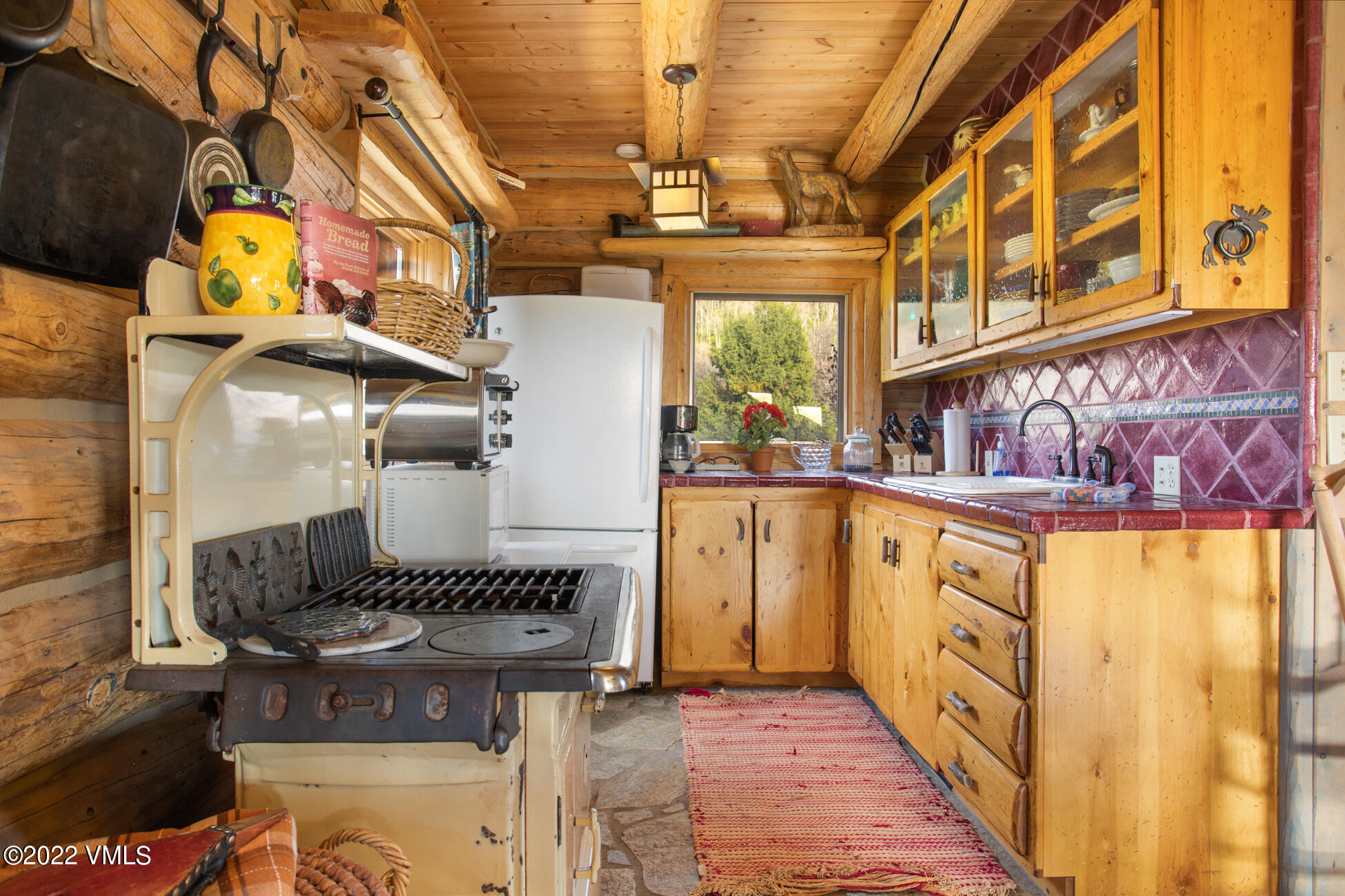 3758 Salt Creek Road Eagle, CO 81631 - Photo 60 of 66 a kitchen with stainless steel appliances granite countertop a stove and cabinets