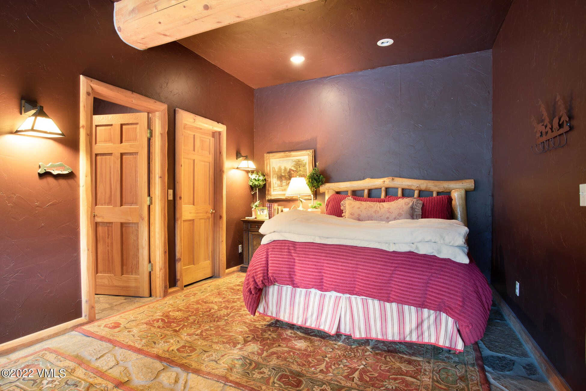 3758 Salt Creek Road Eagle, CO 81631 - Photo 61 of 66 a bedroom with a bed and a lamp
