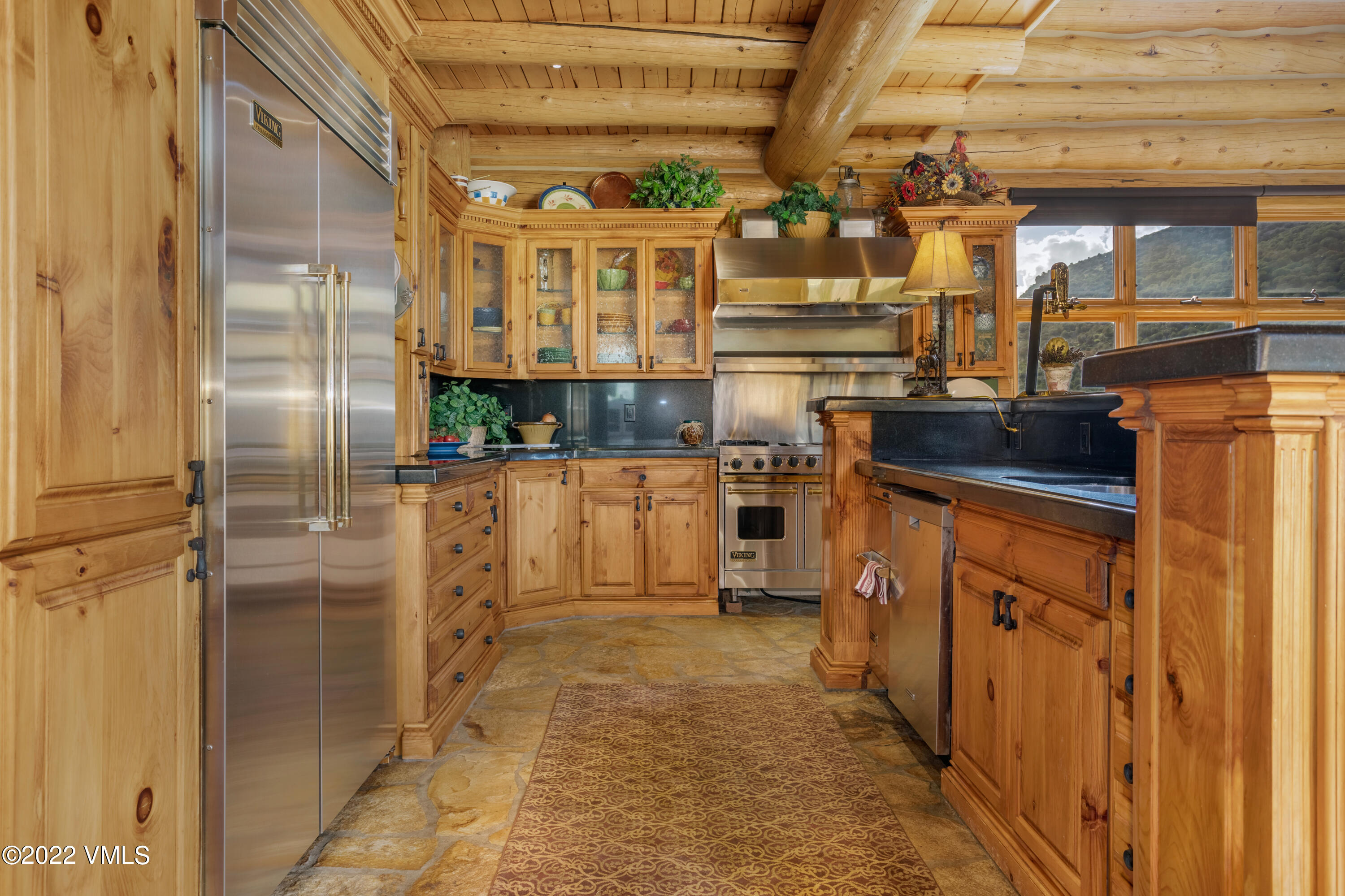 3758 Salt Creek Road Eagle, CO 81631 - Photo 66 of 66 a kitchen with cabinets and stainless steel appliances