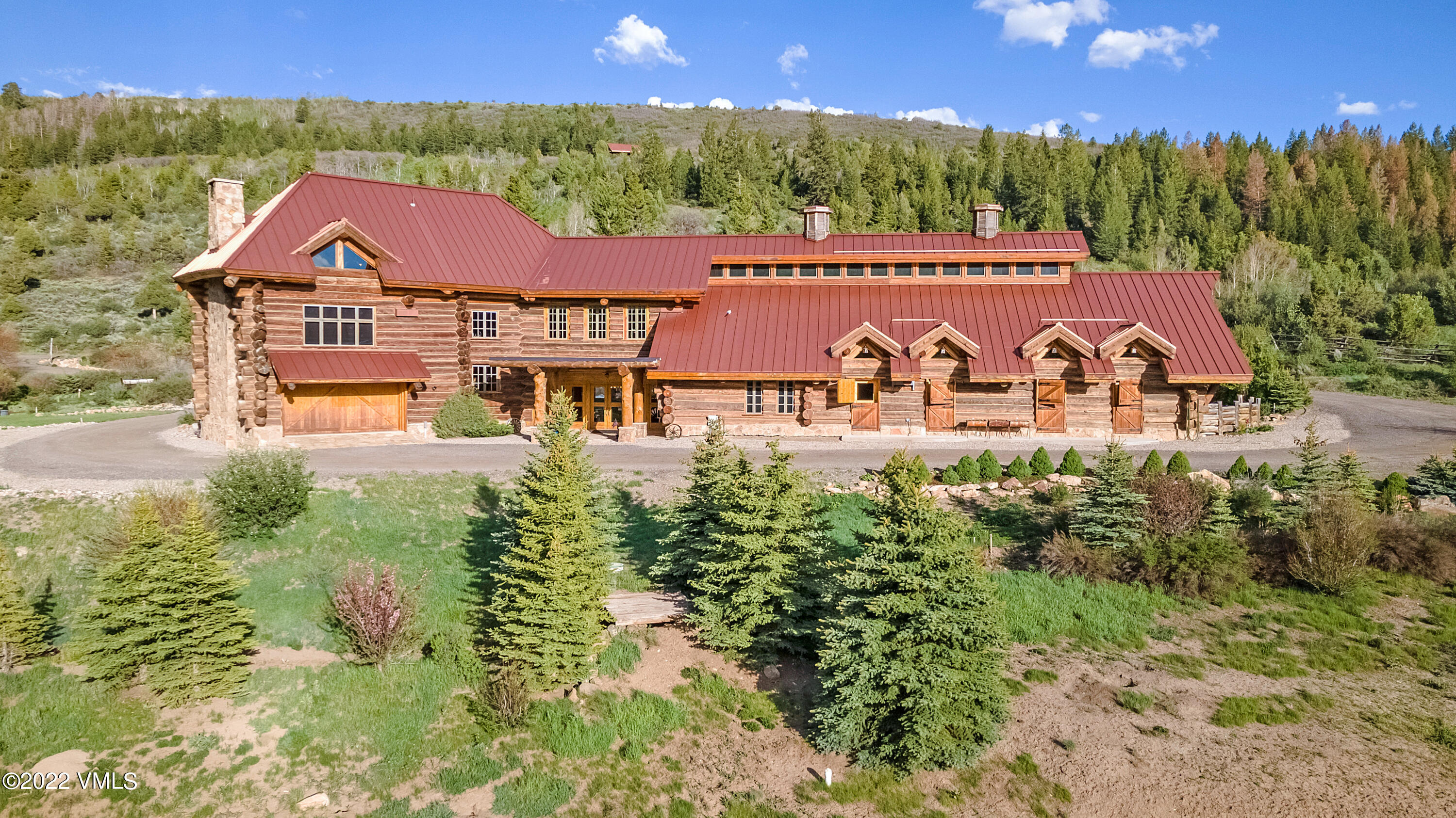 3758 Salt Creek Road Eagle, CO 81631 - Photo 9 of 66 a view of a house with garden and lawn chairs